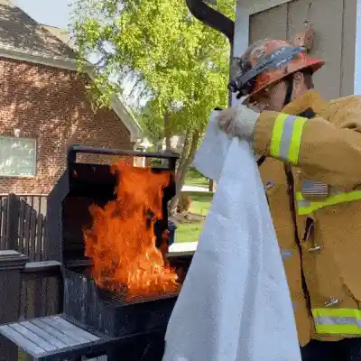 Fire Blanket in action