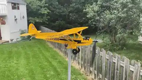 Handmade aviation-themed weathervane